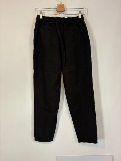 DES PETITIS HAUTS. Pantalón negro pinzas