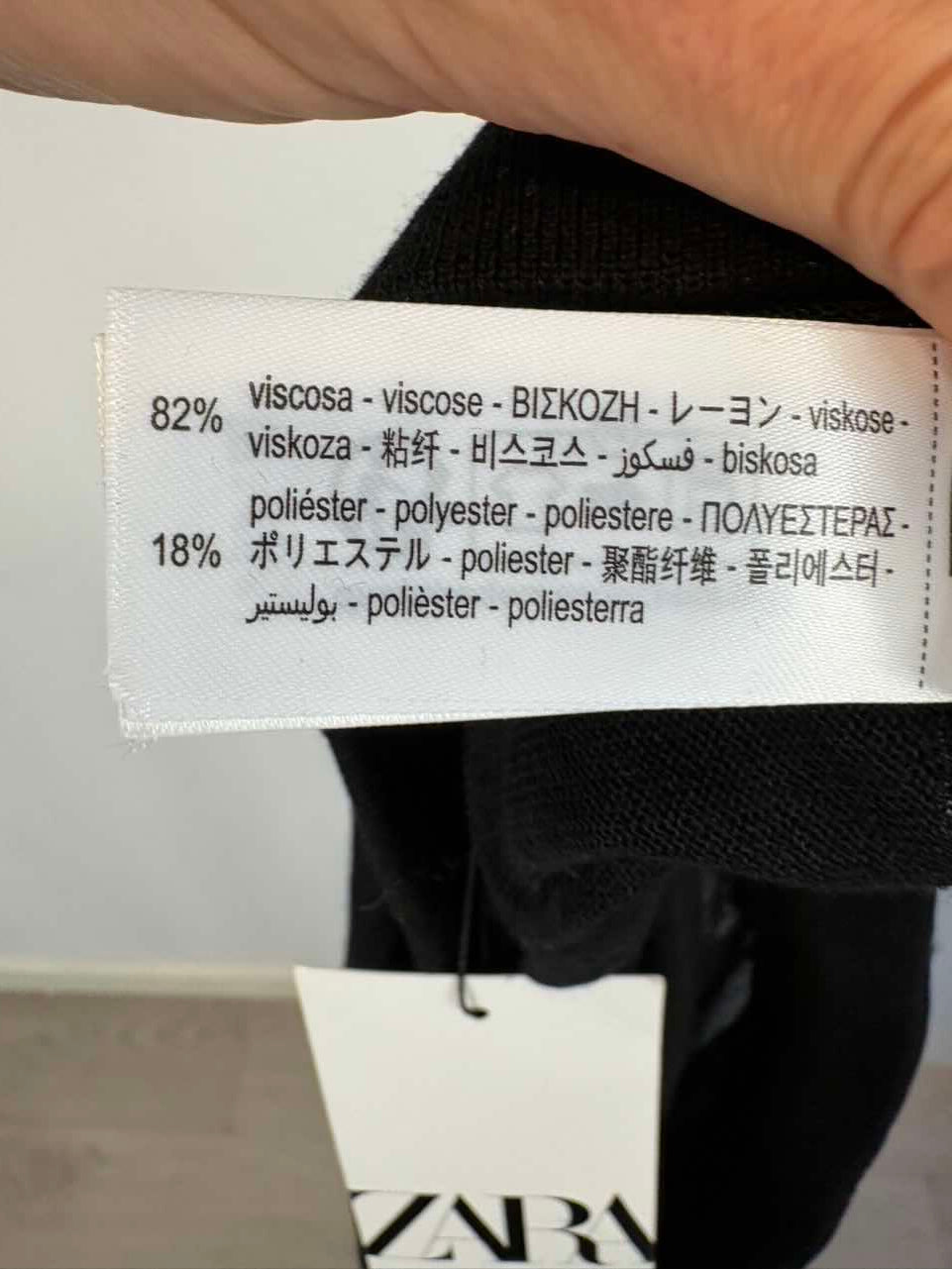 ZARA. Pantalón negro fluido semi transparente