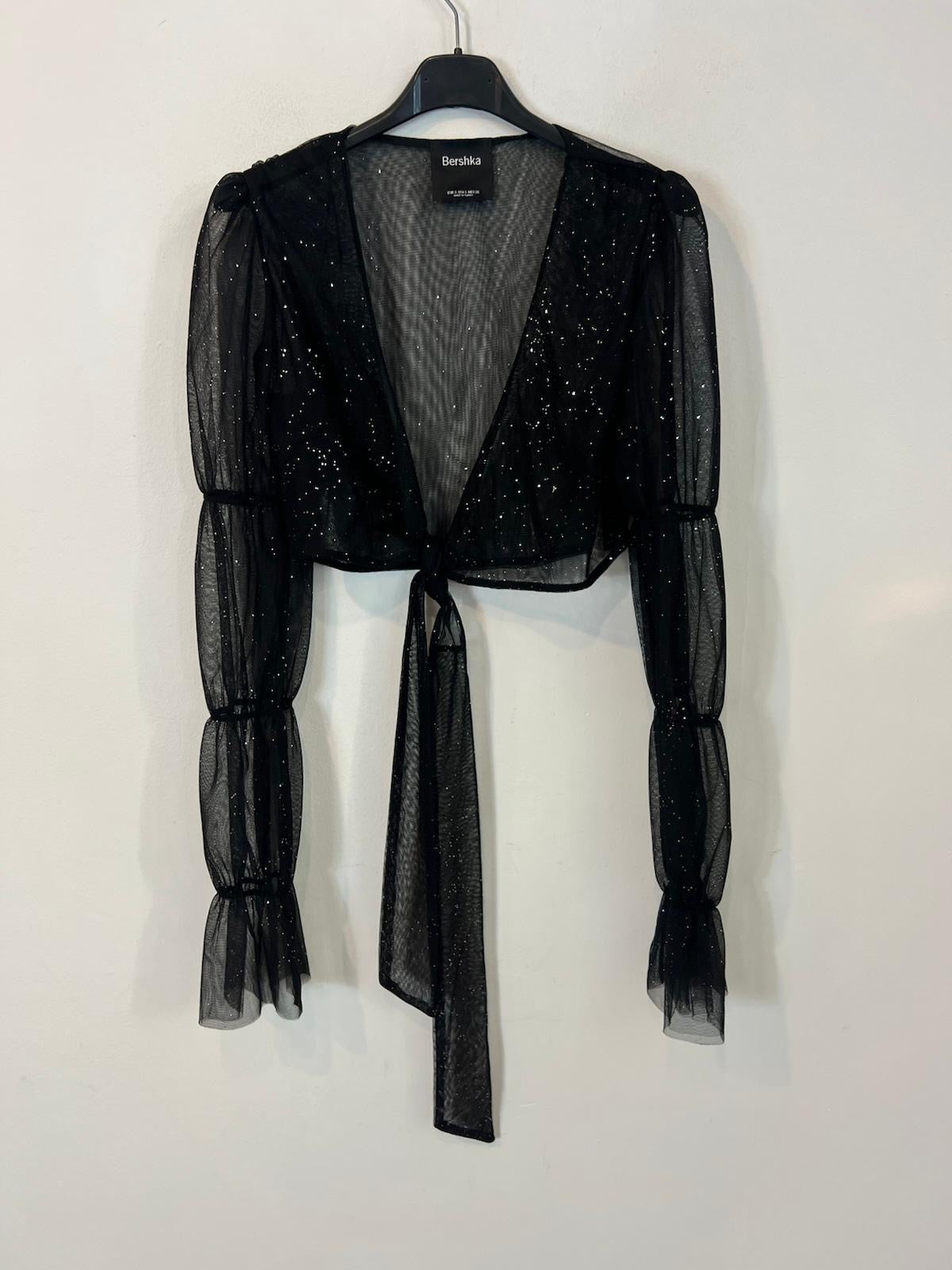 Top cruzado negro detalle mangas