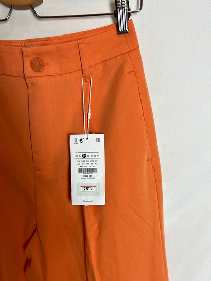 BERSHKA. Total look naranja T.s