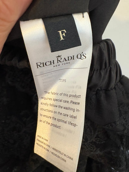 RICH RADI Q´S. Falda midi encaje volantes