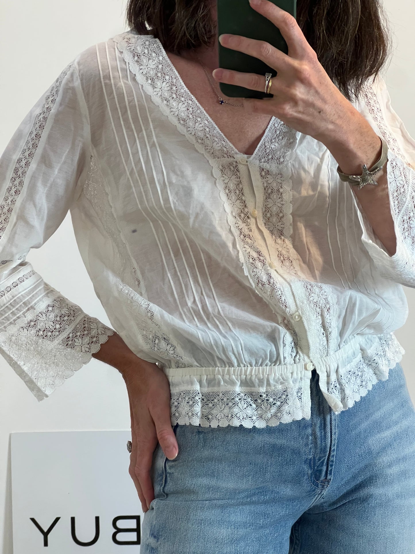 THAT ONE OR THAT ONE. White lace blouse. TS