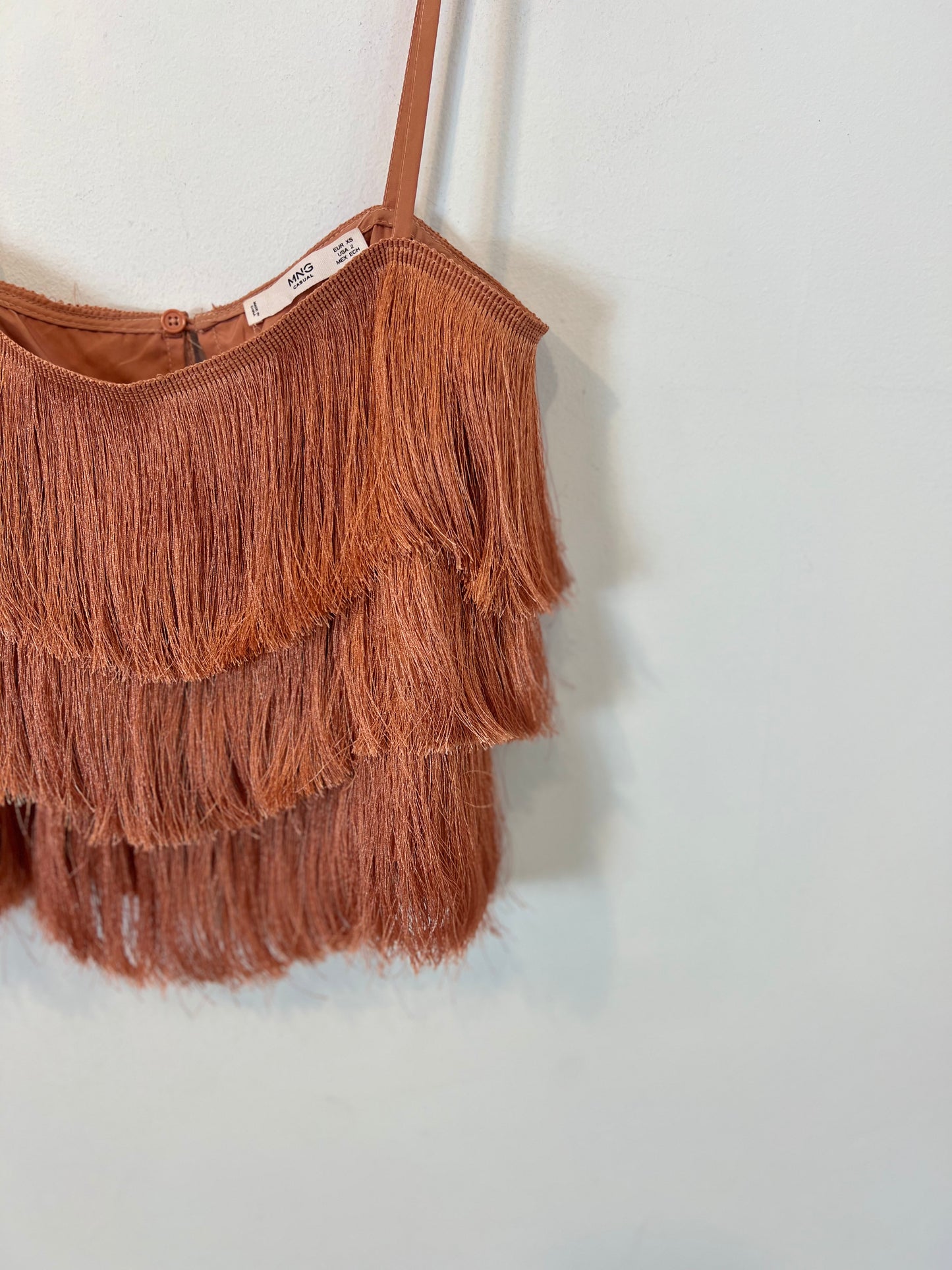 MANGO. Top flecos salmón T.xs