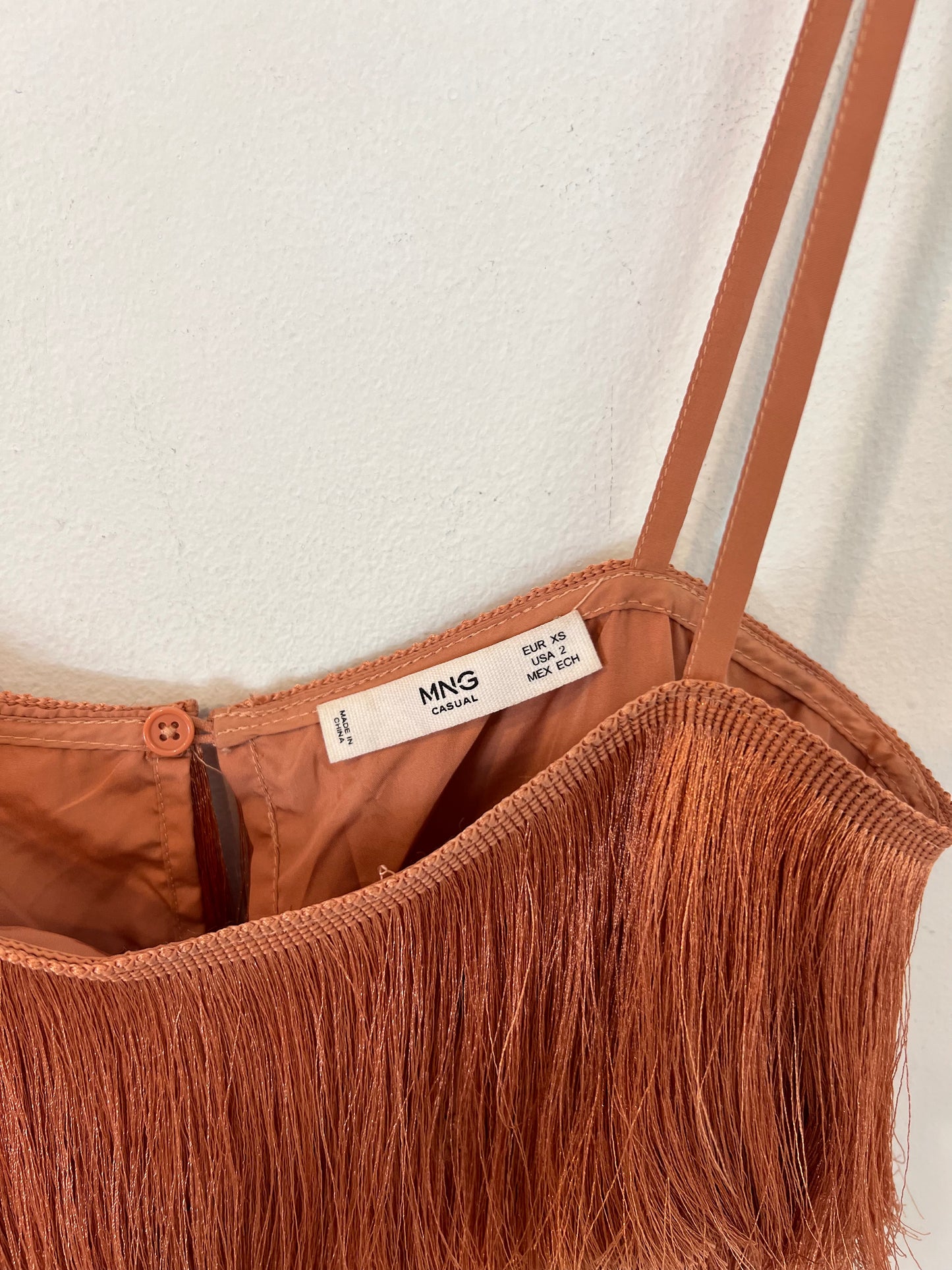 MANGO. Top flecos salmón T.xs