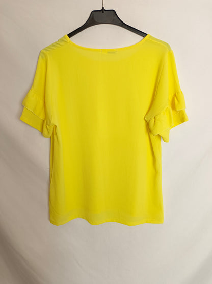 CELOPWOMAN. Blusa amarilla manga cortaT.M