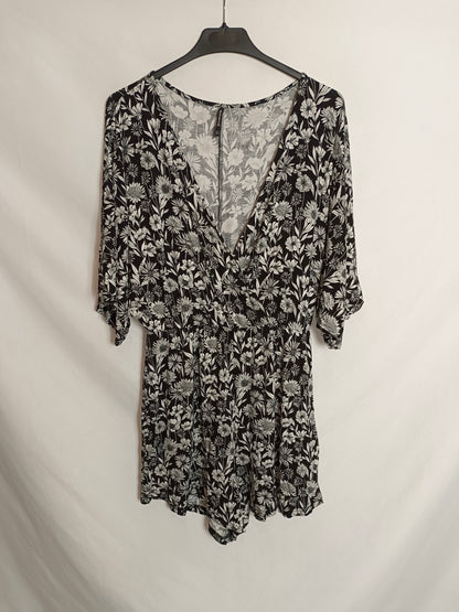 STRADIVARIUS. Black jumpsuit with white print.TM