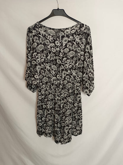STRADIVARIUS. Black jumpsuit with white print.TM
