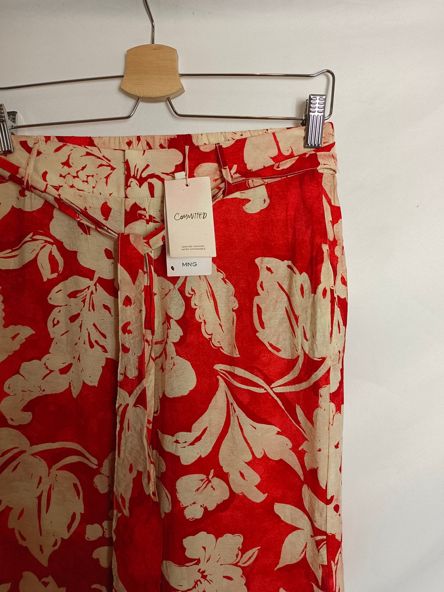 MANGO. Flowy floral trousers Tm