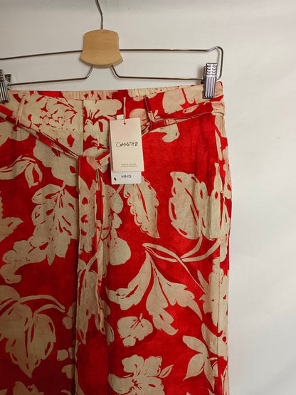 MANGO. Flowy floral trousers Tm