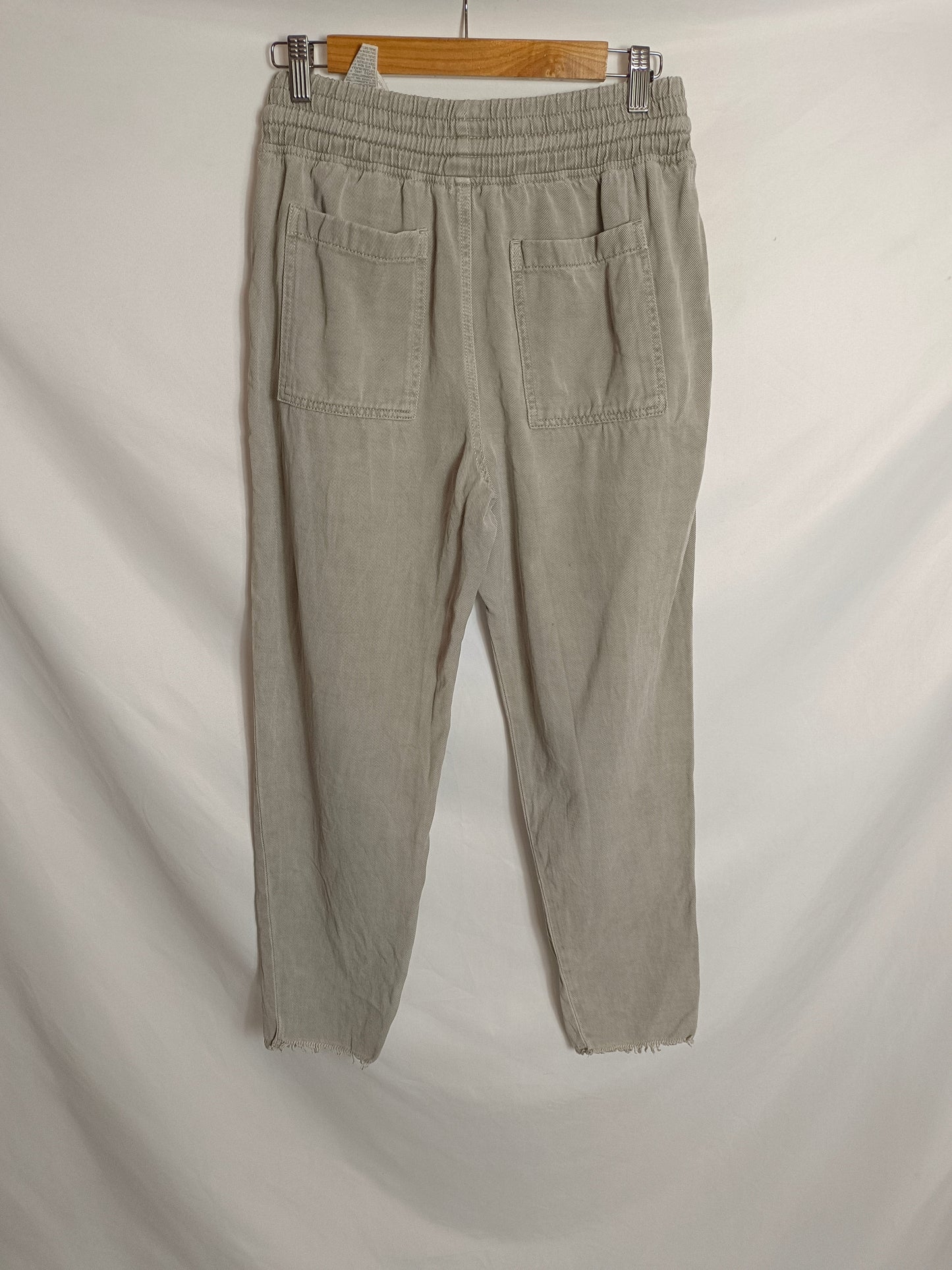 ZARA. Flowy distressed grey trousers Ts
