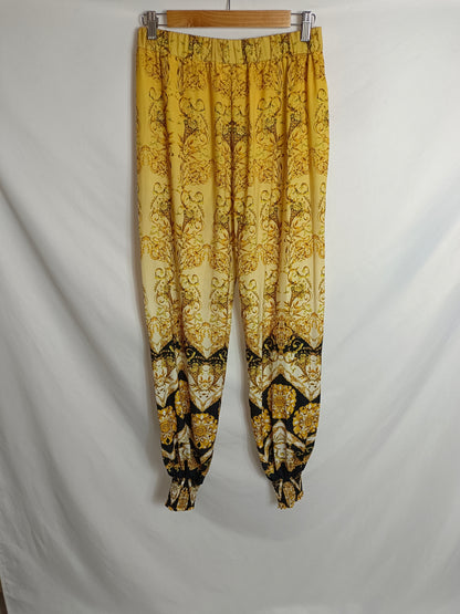 FOREVER UNIQUE. Pantalón fluido estampado T.38