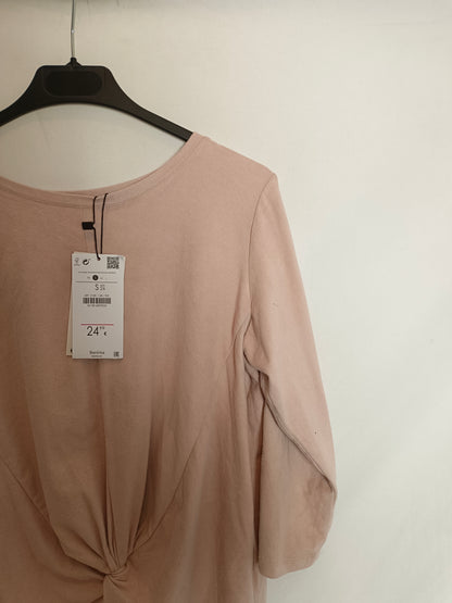 BERSHKA. Pink suede Ts top