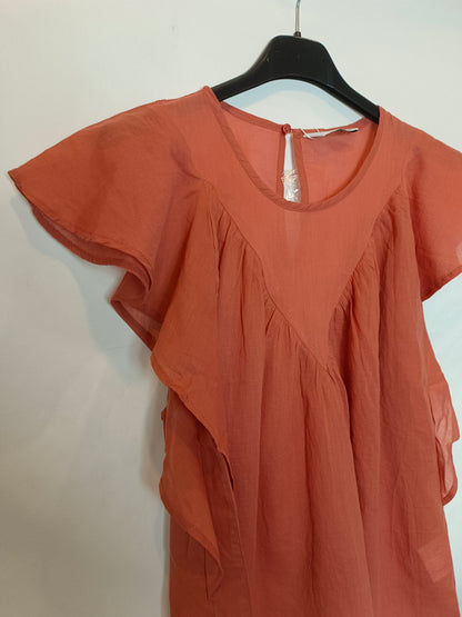 Fantastic company. Orange ruffled Ts blouse