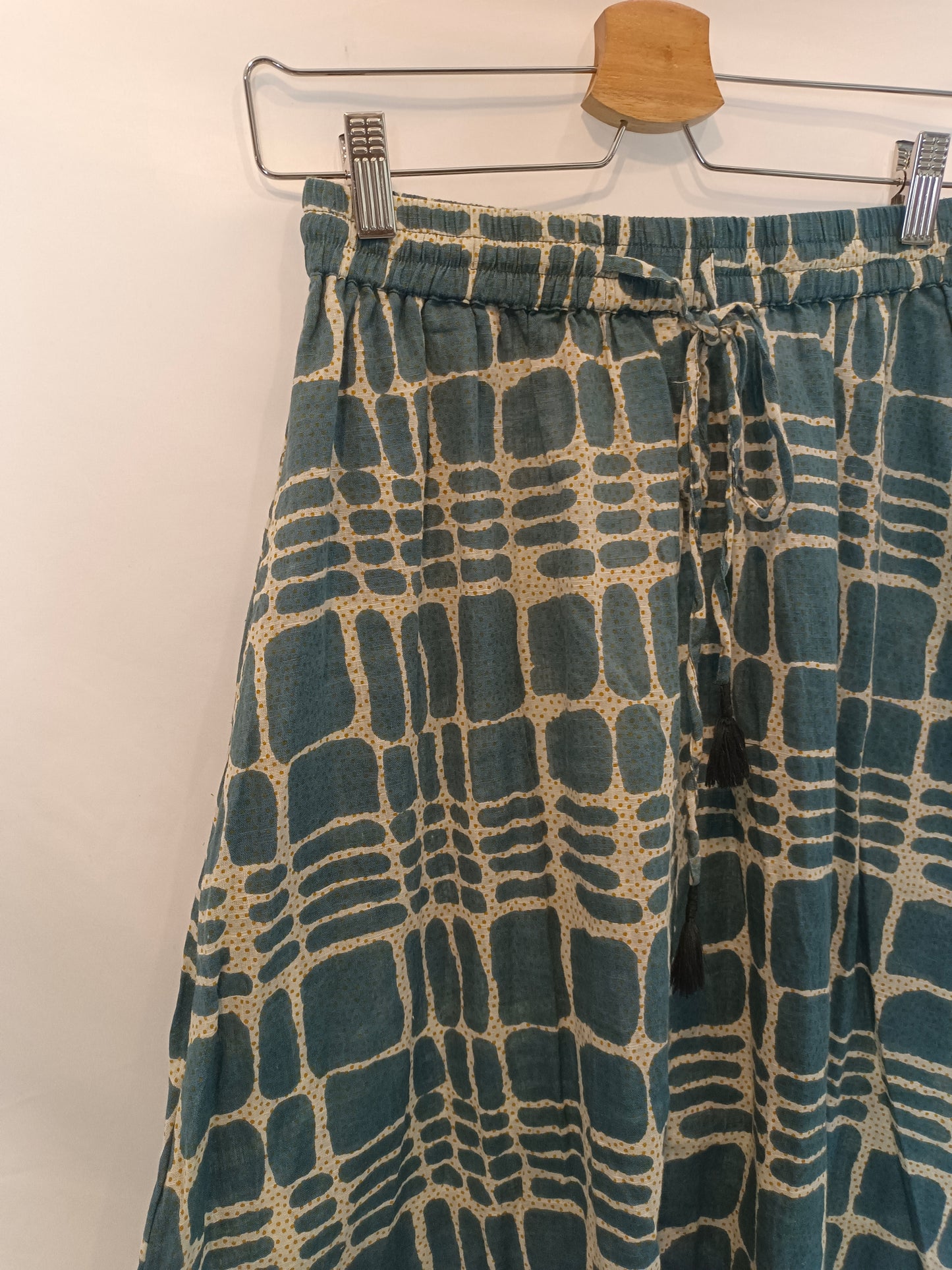 FABINDIA. Blue baggy pants with Ts print