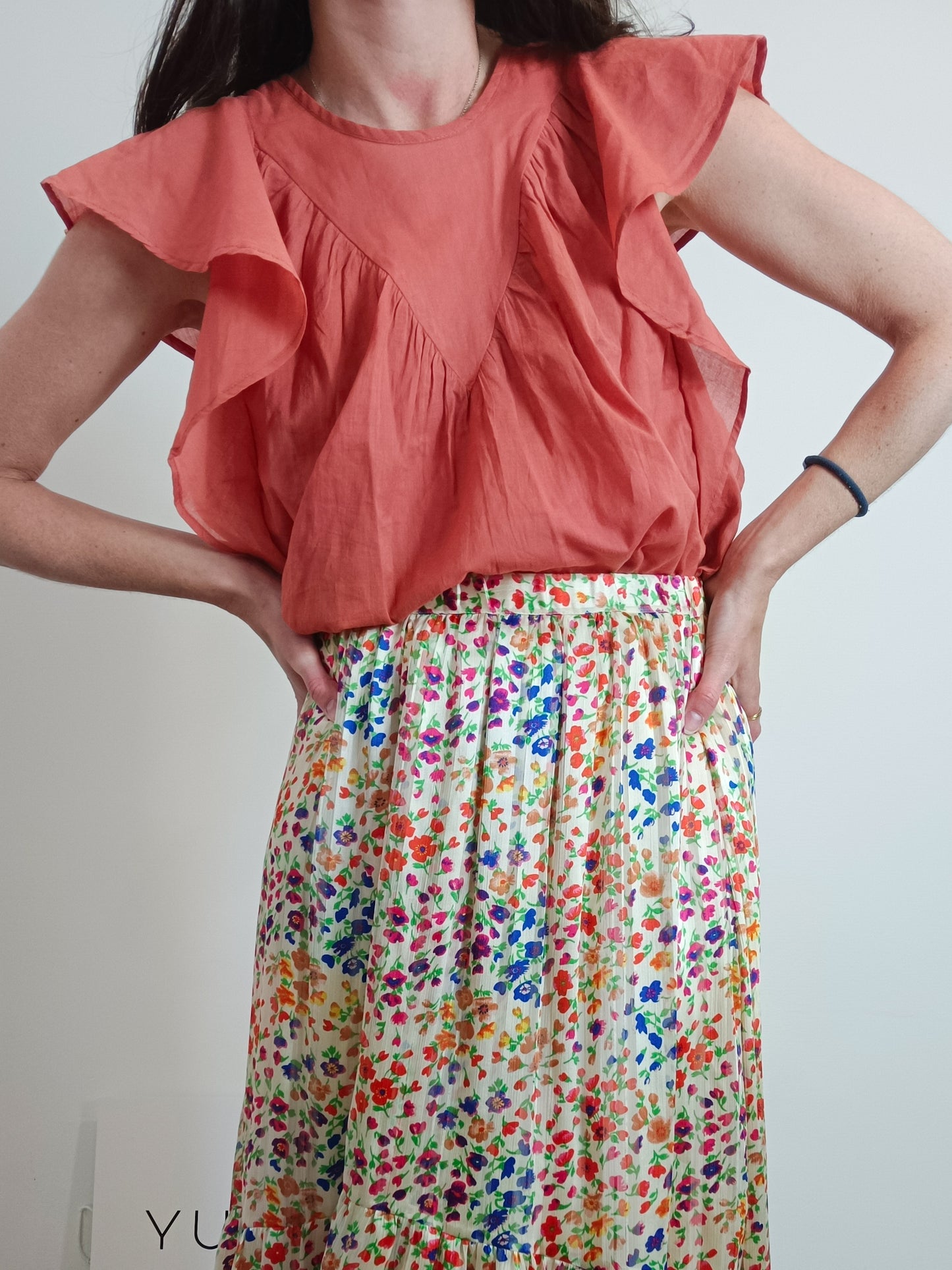 Fantastic company. Orange ruffled Ts blouse