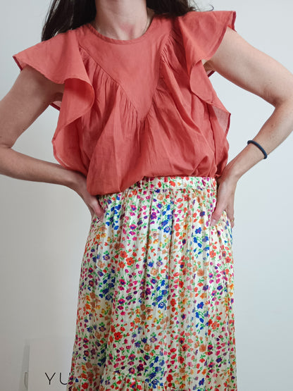 Fantastic company. Orange ruffled Ts blouse