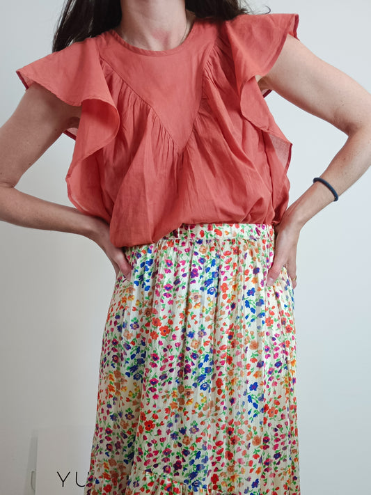 Fantastic company. Orange ruffled Ts blouse