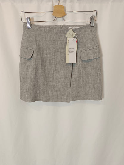SINSAY. Gray skirt with Ts pockets