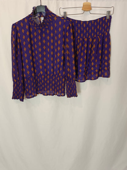 MONISQUI. Total look morado Tu(M)