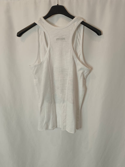 BETWEENTHEFLAGS. Camiseta blanca letras T.xs