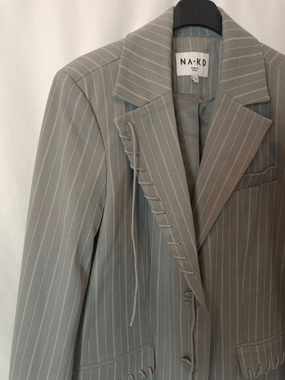 KA-KD. Gray blazer with Ts stripes