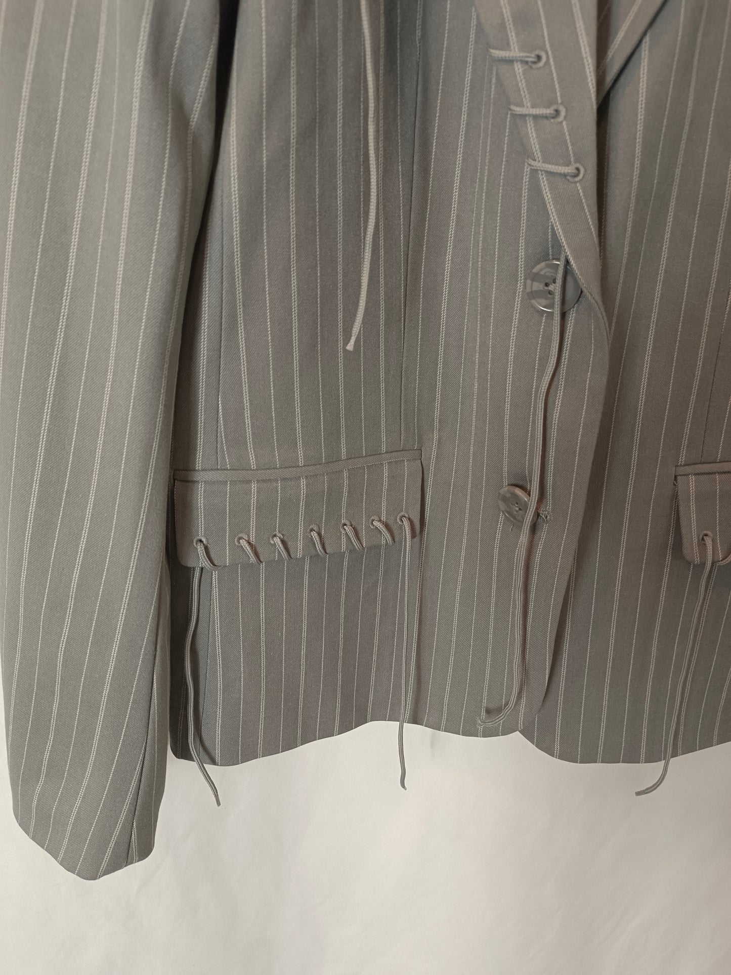 KA-KD. Gray blazer with Ts stripes