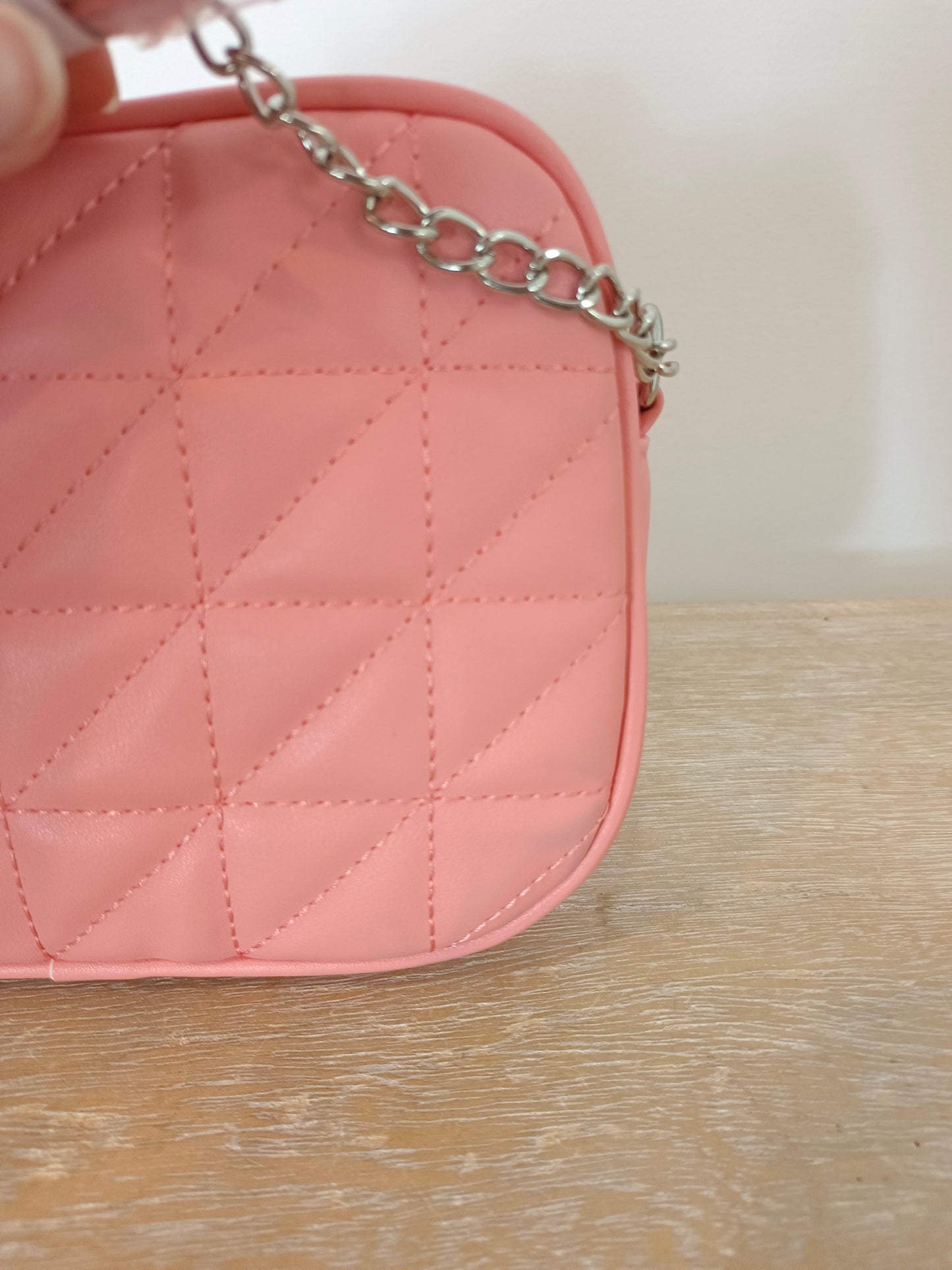 INSIDE. Bolso textura rosa