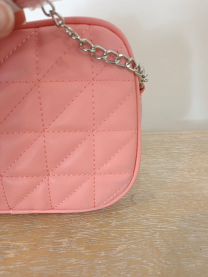 INSIDE. Bolso textura rosa