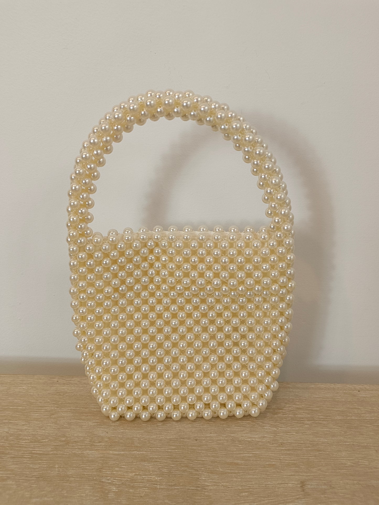 H&amp;M. Short-handled pearl bag