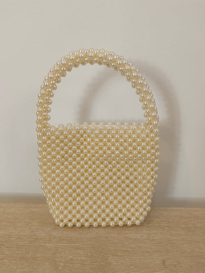 H&amp;M. Short-handled pearl bag