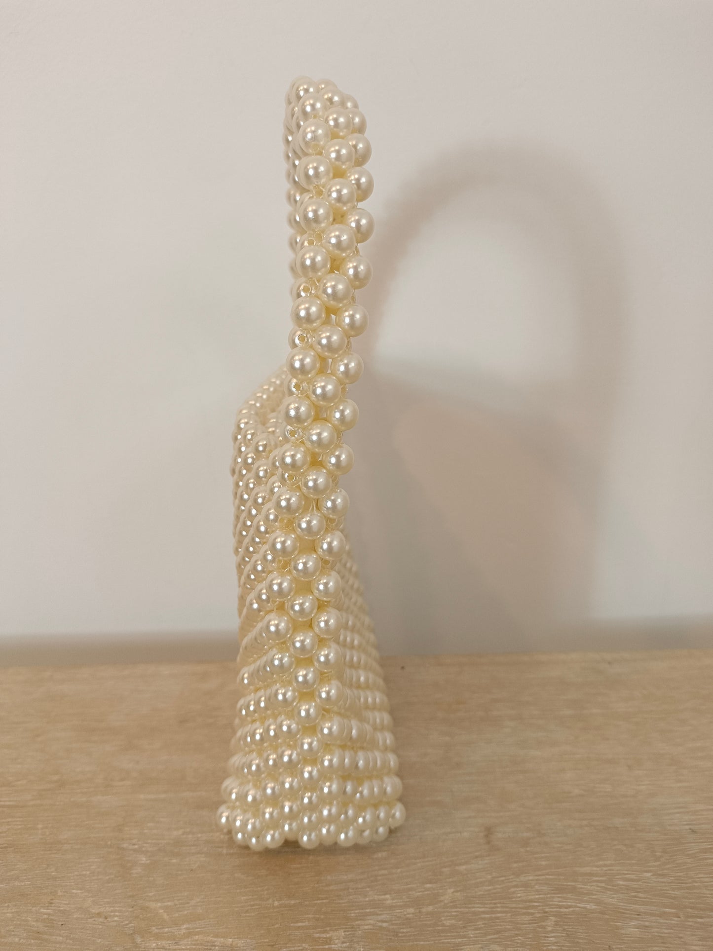 H&amp;M. Short-handled pearl bag