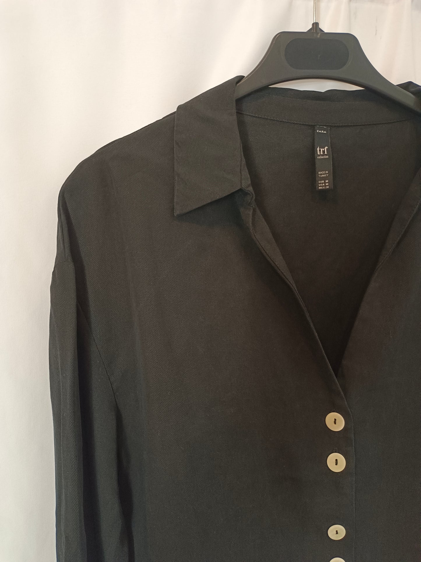 ZARA. Black blouse with white buttons Tm