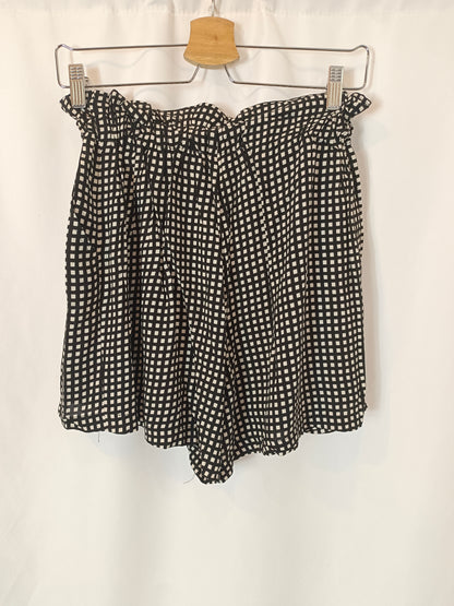 MANGO. Falda/pantalón negro cuando T.s