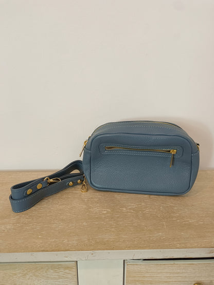 OTHERS. Blue leather bag with zippers