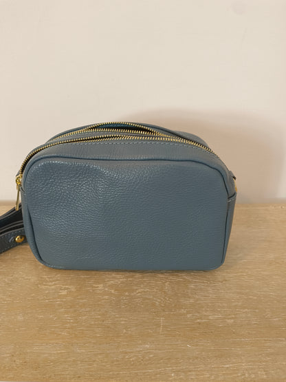 OTHERS. Blue leather bag with zippers