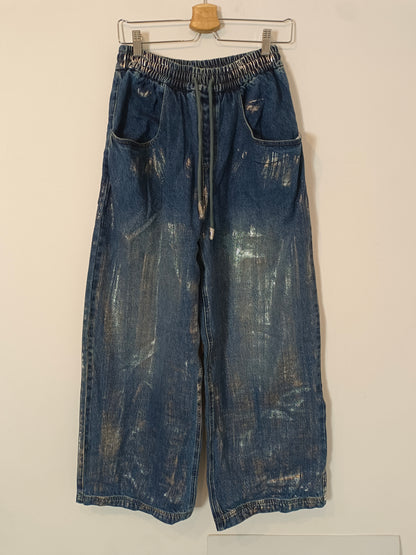 FABRIQUE.  Pantalón vaquero detalles plateados T.s