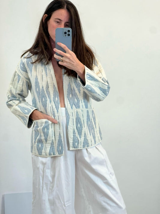 ZARA. Chaqueta azul claro textura