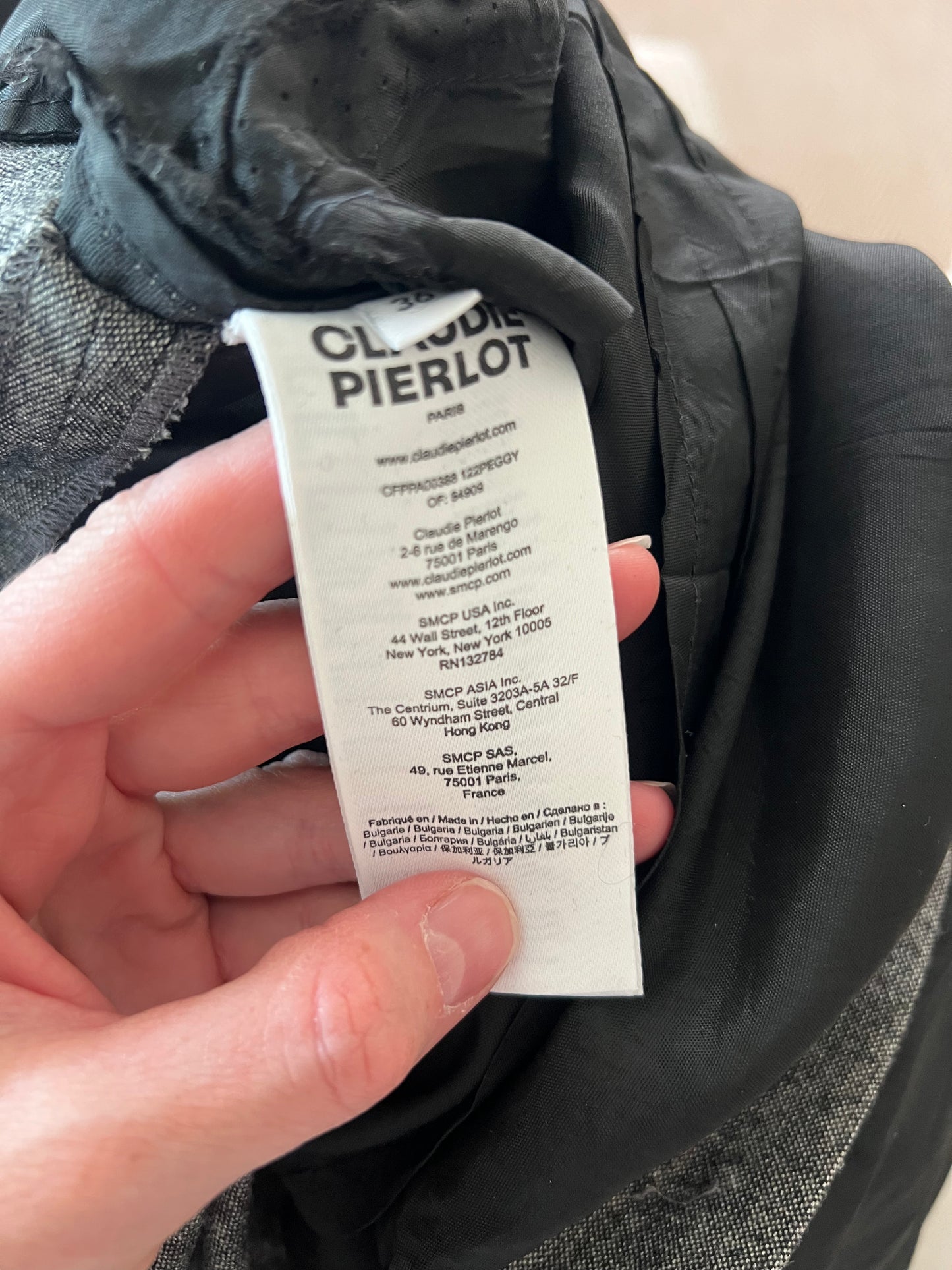 CLAUDIE PIERLOT. Pantalón espiga gris pinzas
