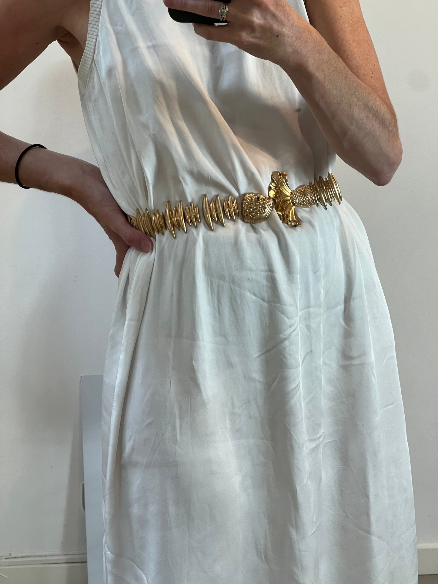 OTRAS. Cinturón dorados pez