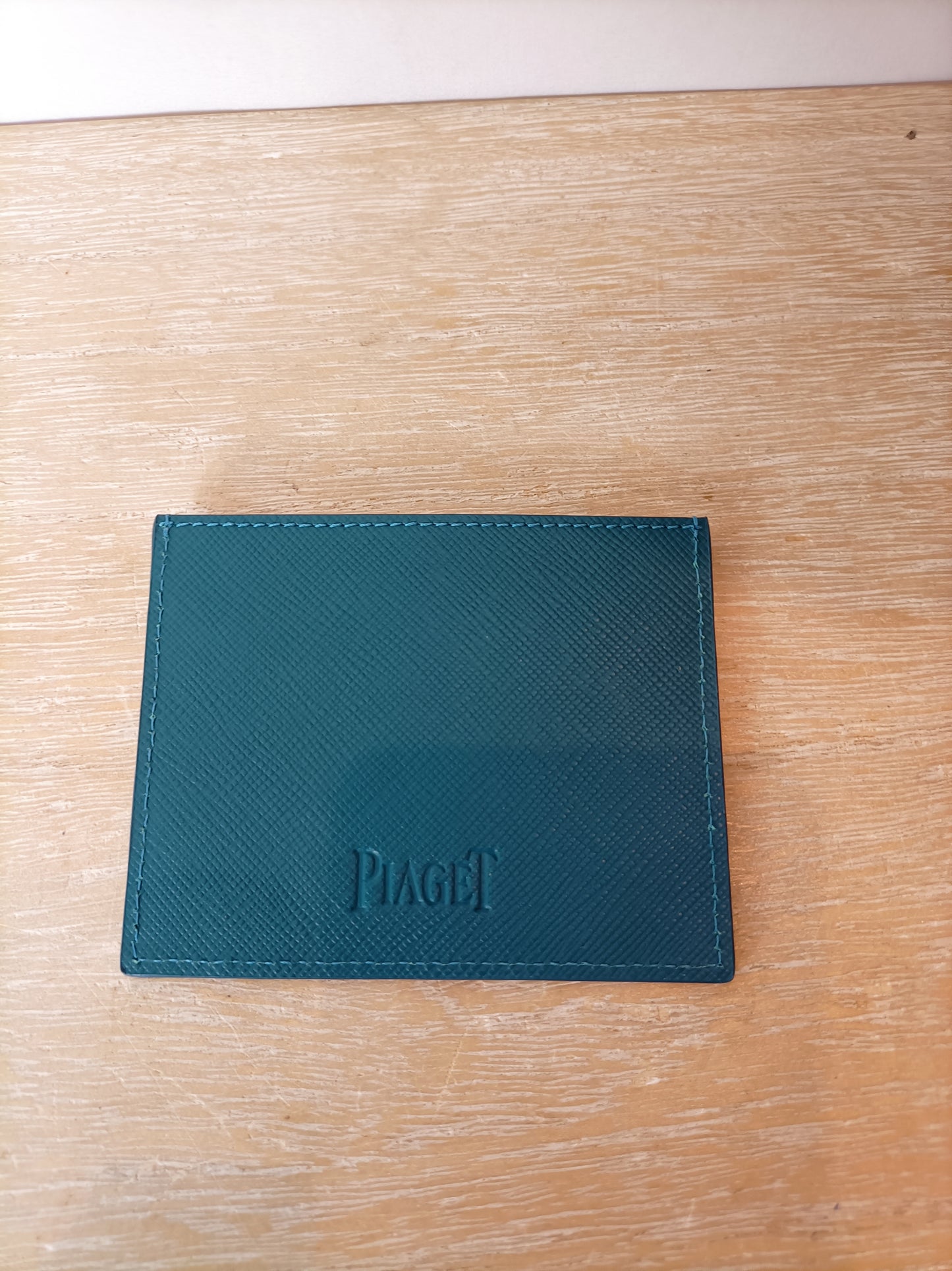 PIAGET. Tarjetero estampado