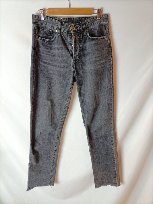 H&M. Pantalón denim negro T.40