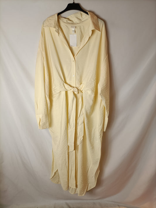 H&amp;M. Beige bow dress T.xxl