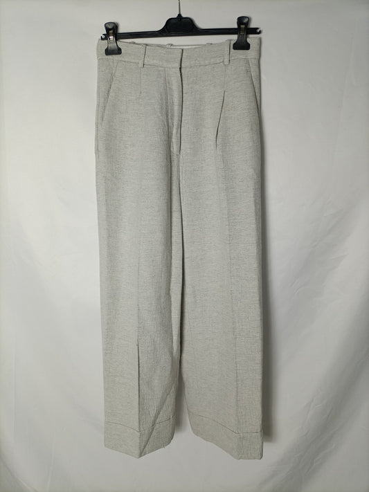 MANGO. Pantalón gris claro jaspeado. T 36