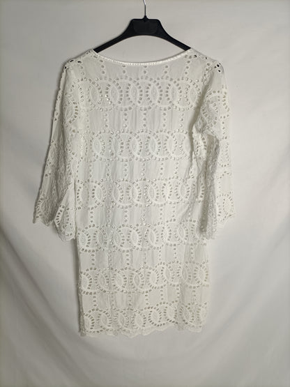 OTHERS. Your white die-cut dress