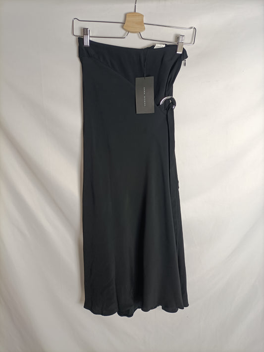 ZARA. Black midi skirt with silver buckle, size XS