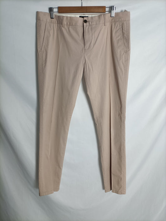 MASSIMO DUTTI. Beige pleated trousers, size 42