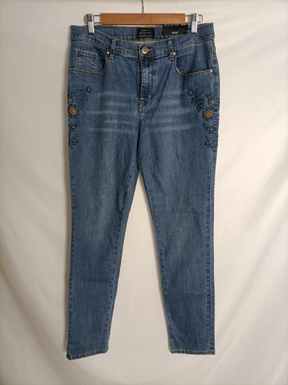 PEDRO DEL HIERRO. Blue jeans with floral detail, size 44