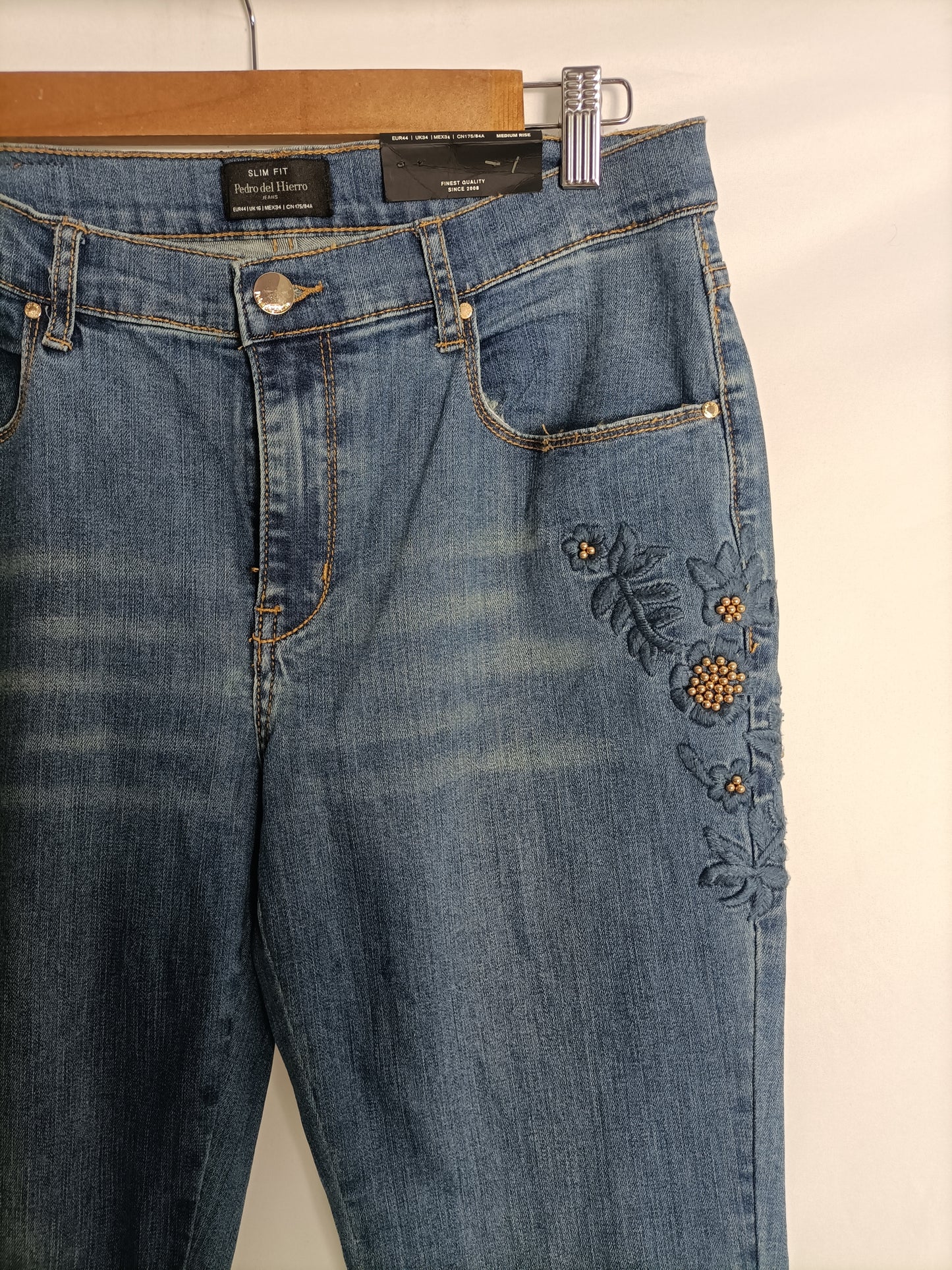 PEDRO DEL HIERRO. Blue jeans with floral detail, size 44