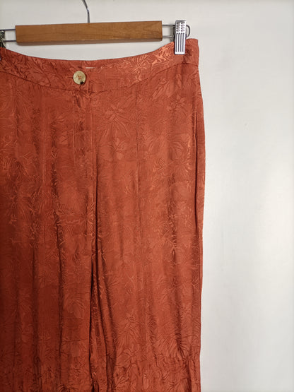 NÍCOLI. Pantalón teja aperturas T.34