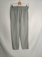 H&M. pantalón gris elástico T.xs